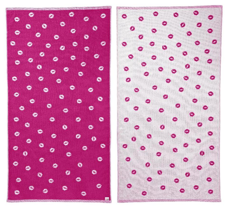 This product image released by One Kings Lane shows a Chrissie Miller reversible beach blanket. Online retailer One King’s Lane has partnered with a number of well-known designers on a beach towel collection that rolls out through the summer. Proceeds support the designers’ preferred charities, including Alpha Workshops, which helps HIV-AIDS victims, and Baby2Baby, which assists Los Angeles families in need. (AP Photo/One Kings Lane)