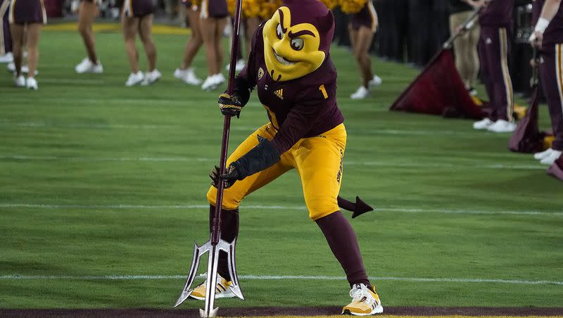 Arizona State’s mascot Sparky sticks a pitchfork into Sun Devil Stadium before a game against Eastern Michigan Saturday, Sept. 17, 2022, in Tempe, Ariz. ASU was recently named one of six new members to the Association of American Universities.