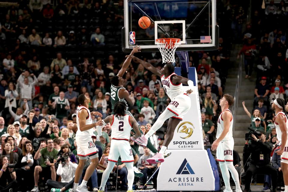 Arizona Wildcats center Oumar Ballo (11) defends against Michigan State Spartans center Mady Sissoko (22) during the first-ever Acrisure Classic in Palm Desert, Calif., on Thanksgiving Day, Nov. 23, 2023.