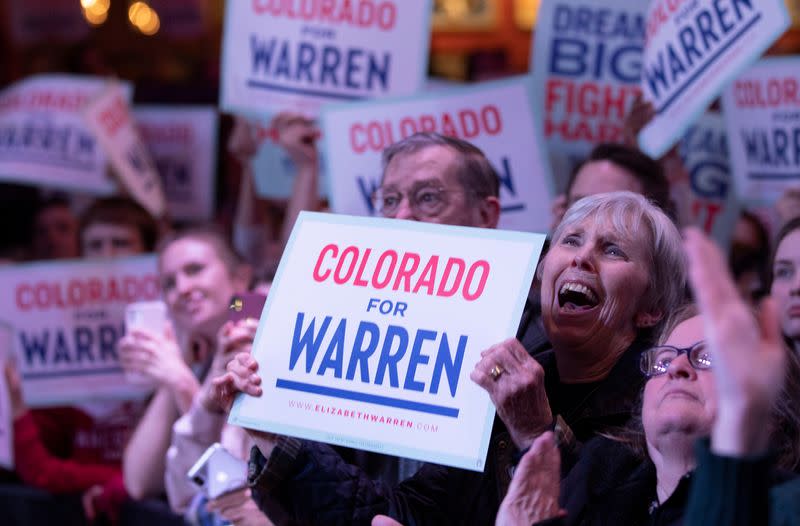 Supporters of U.S. Democratic presidential candidate Senator Elizabeth Warren cheer during a campaign rally in Denver