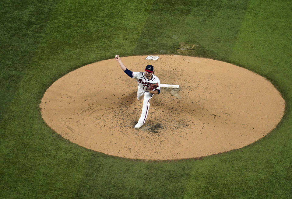 ARLINGTON, TX - OCTOBER 15: Bryse Wilson #46 of the Atlanta Braves pitches during Game 4 of the NLCS between the Atlanta Braves and the Los Angeles Dodgers at Globe Life Field on Thursday, October 15, 2020 in Arlington, Texas. (Photo by Cooper Neill/MLB Photos via Getty Images)