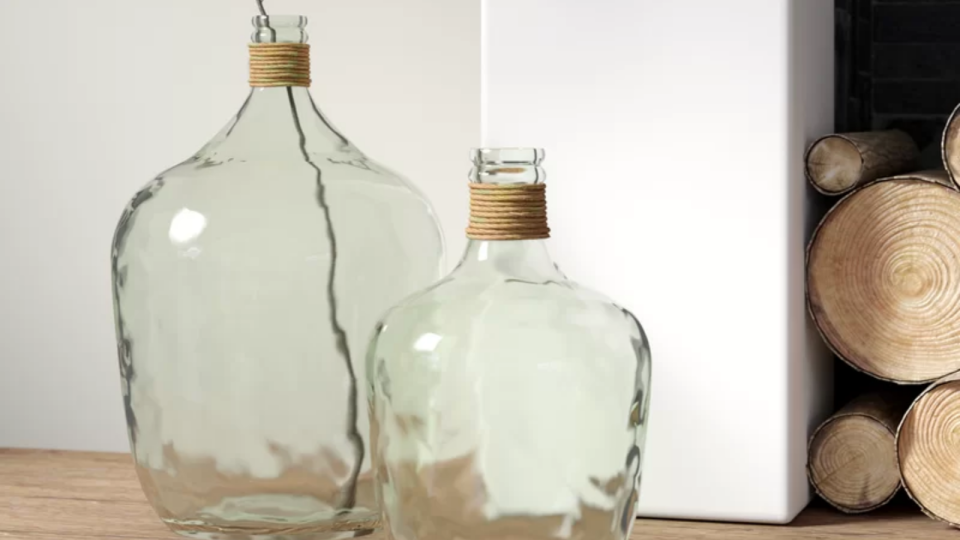 This vase comes in two sizes, perfect for any living space.