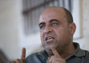 Nizar Banat, an outspoken of the Palestinian Authority, speaks to journalists at the family house, in the West Bank city of Hebron, May 4, 2021. Banat who had intended to run in parliamentary elections before they were cancelled earlier this year died during his arrest by Palestinian Authority forces early Thursday, June 24, 2021, officials said. (AP Photo/Nasser Nasser)