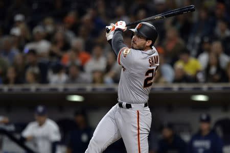 Sep 18, 2018; San Diego, CA, USA; San Francisco Giants left fielder Chris Shaw (26) hits a two RBI single in the eighth inning against the San Diego Padres at Petco Park. Mandatory Credit: Jake Roth-USA TODAY Sports
