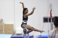 Gabby Douglas competes on the balance beam at the American Classic Saturday, April 27, 2024, in Katy, Texas. (AP Photo/David J. Phillip)