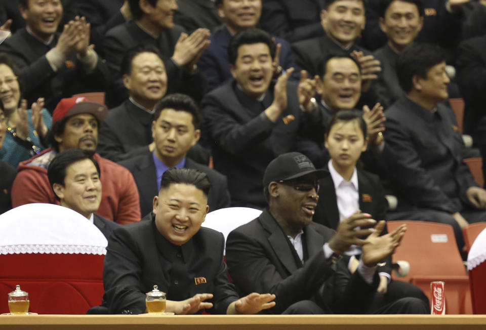 FILE - In this Thursday, Feb. 28, 2013 file photo released by VICE Media, North Korean leader Kim Jong Un, left, and former NBA star Dennis Rodman watch North Korean and U.S. players in an exhibition basketball game at an arena in Pyongyang, North Korea. Rodman is tapping his friendship with Kim Jong Un to call for the release of a Korean-American man detained in the North. In a tweet on Wednesday, May 8, 2013, Rodman called on Kim "to do me a solid and cut Kenneth Bae loose." (AP Photo/VICE Media, Jason Mojica, File)