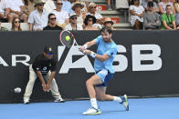 Cameron Norrie of Britain plays a return shot to Richard Gasquet of France in the mens singles final of the ASB Classic tennis event in Auckland, New Zealand, Saturday, Jan. 14, 2023. (Andrew Cornaga/Photoport via AP)