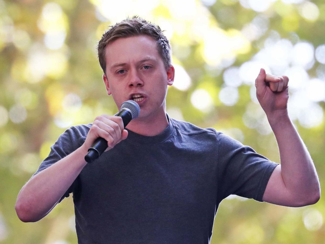 Owen Jones makes a speech at the UK Student Climate Network's Global Climate Strike on Millbank in Westminster, London: Gareth Fuller/PA