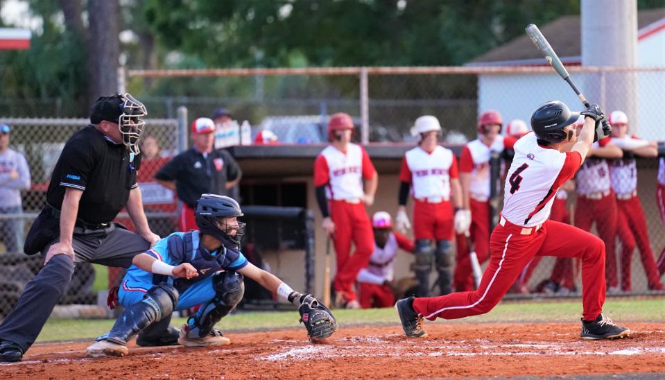 Vero Beach's Chase Wilson hits a double in the second inning against Centennial during the District 10-7A title game on Thursday, May 4, 2023 in Vero Beach. Centennial won 7-6.