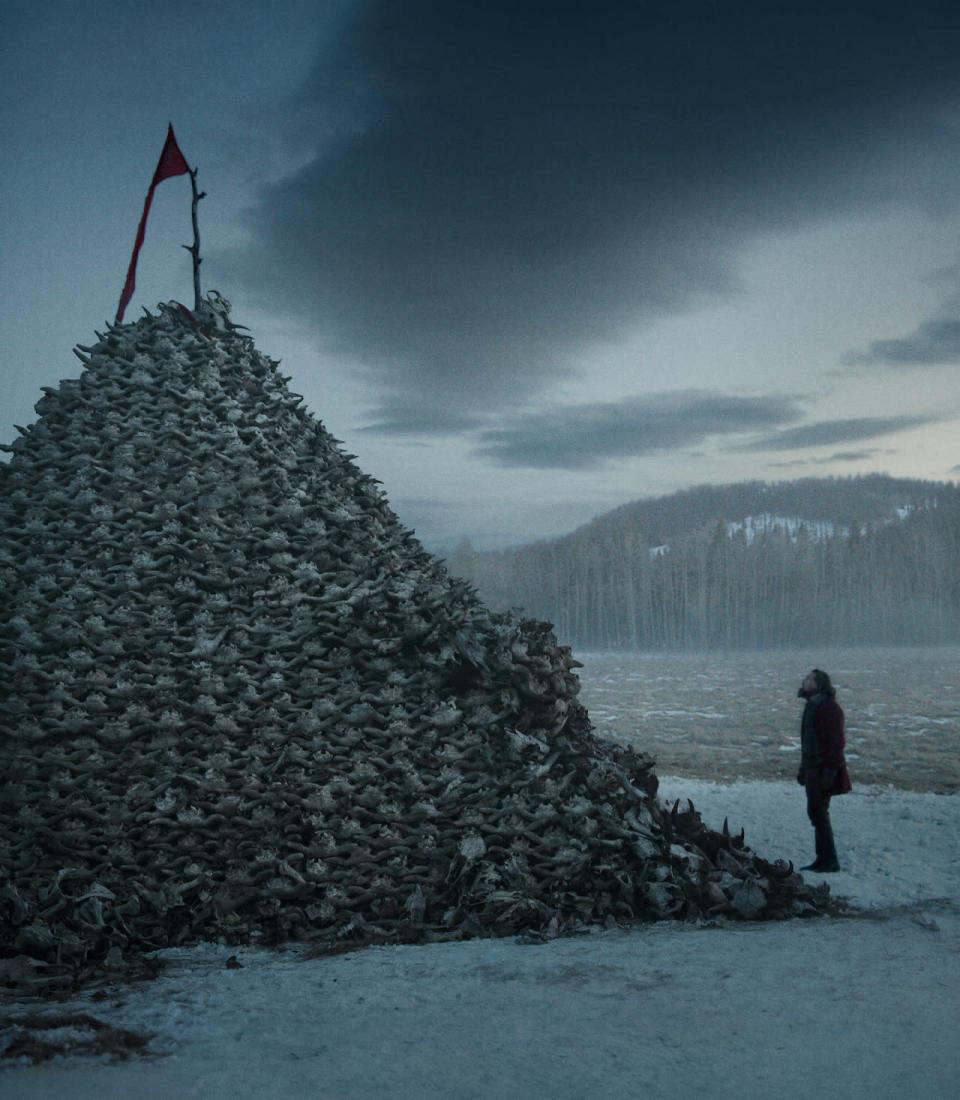 <p>Part of a dream sequence, this scene depicts Glass (DiCaprio) observing a pile of roughly 10,000 buffalo skulls. Iñárritu was more concerned with Glass’s inner thoughts and added scenes that aren’t in the original book. “He didn’t worry about religiously doing the story,” says Fisk of the director. </p>