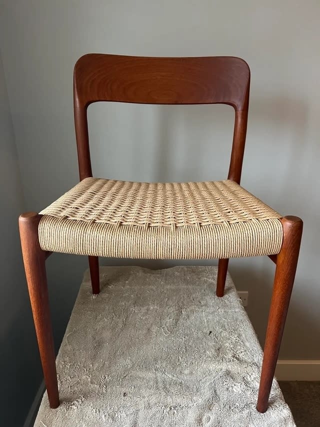 The teak chair after with brand-new caning
