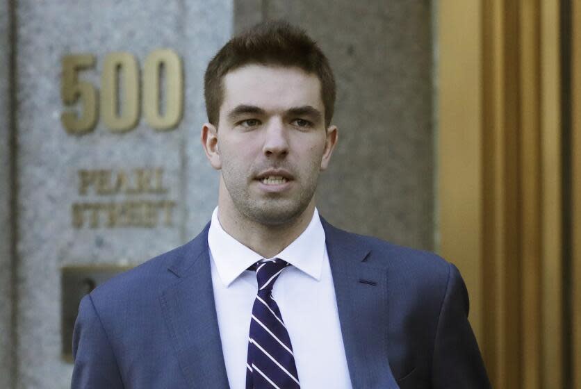 FILE - In this March 6, 2018 file photo, Billy McFarland, the promoter of the failed Fyre Festival in the Bahamas, leaves federal court after pleading guilty to wire fraud charges in New York. A federal judge has given McFarland a six-year prison term. McFarland was sentenced Thursday, Oct. 11 in Manhattan federal court. Judge Naomi Reice Buchwald called him a "serial fraudster." (AP Photo/Mark Lennihan, File)