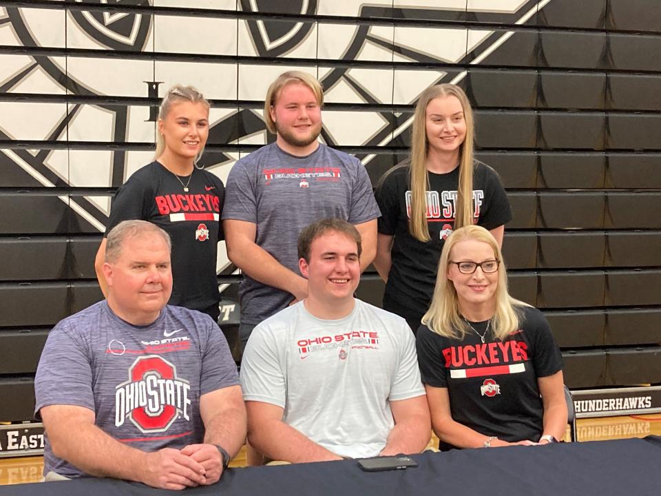 Austin Siereveld with his family on Wednesday, May 4 at Lakota East. The Thunderhawks junior lineman committed to Ohio State over Alabama and Notre Dame.