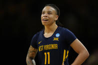 West Virginia guard JJ Quinerly (11) reacts in the second half of a second-round college basketball game against Iowa in the NCAA Tournament, Monday, March 25, 2024, in Iowa City, Iowa. (AP Photo/Charlie Neibergall)