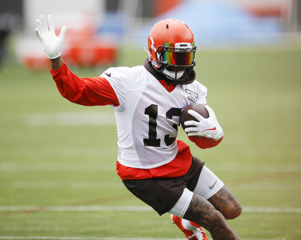 Cleveland Browns wide receiver Odell Beckham Jr. runs through a drill at the team's NFL football training facility in Berea, Ohio, Tuesday, June 4, 2019. (AP Photo/Ron Schwane)