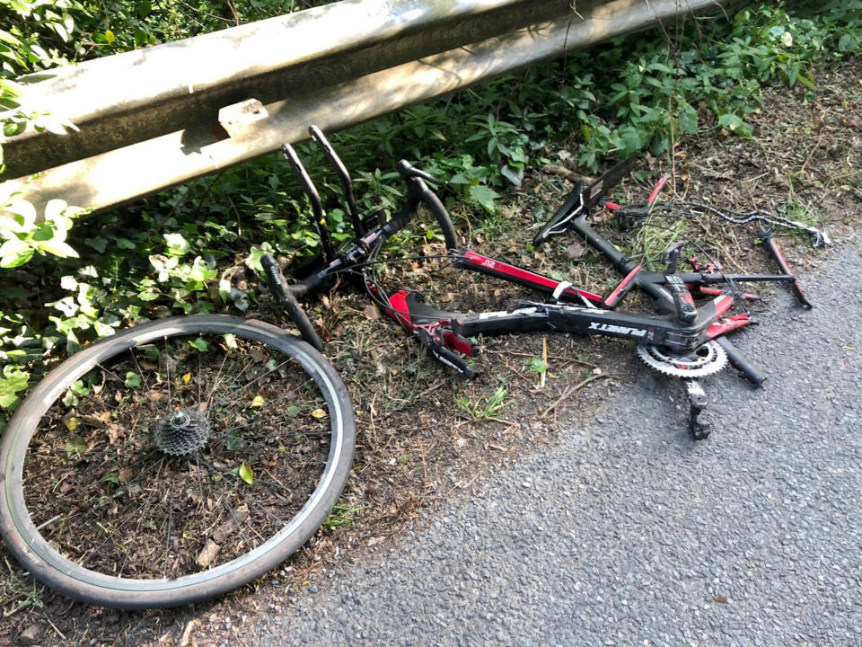 A picture of Jean-Pierre de Villiers' bike. It's smashed, flattened and missing its rear wheel. Mr de Villiers was hit by a car while undertaking a long distance charity bike ride. It left him with both his legs broken and a number of internal injuries.