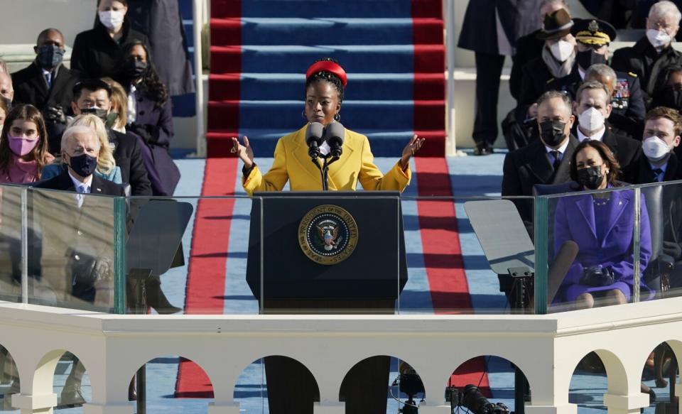 National youth poet laureate Amanda Gorman recites her inaugural poem during President Biden's inauguration.