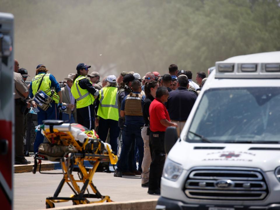 Emergency personnel gather near Robb Elementary School following a shooting, Tuesday, May 24, 2022, in Uvalde, Texas.