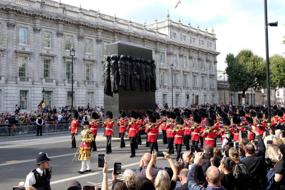 The military procession as the Queen’s coffin is carried on a horse-drawn gun carriage from Buckingham Palace to Westminster Hall (Tristan Fewings/PA) (PA Wire)