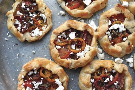 Heirloom Tomato Galettes with Urfa Chilies, Mint and Ricotta Salata, a dish that appears in chef Aliya LeeKong's first cookbook "Exotic Tables", is shown in this handout photo taken August 14, 2012 and provided by LeeKong on June 30, 2014. REUTERS/Aliya LeeKong/Handout via Reuters