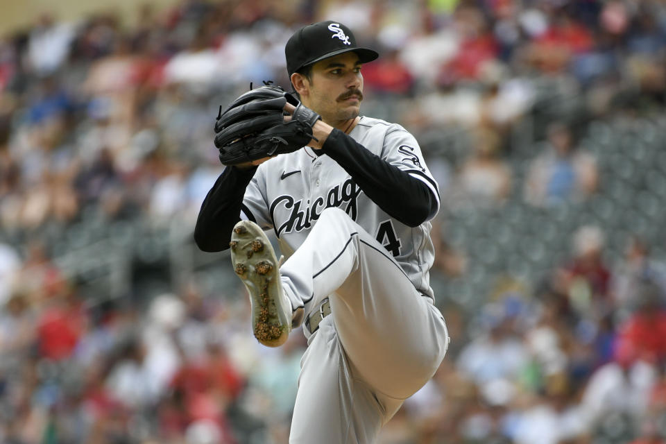 Chicago White Sox pitcher Dylan Cease throws against the Minnesota Twins during the first inning of a baseball game, Sunday, July 17, 2022, in Minneapolis. (AP Photo/Craig Lassig)