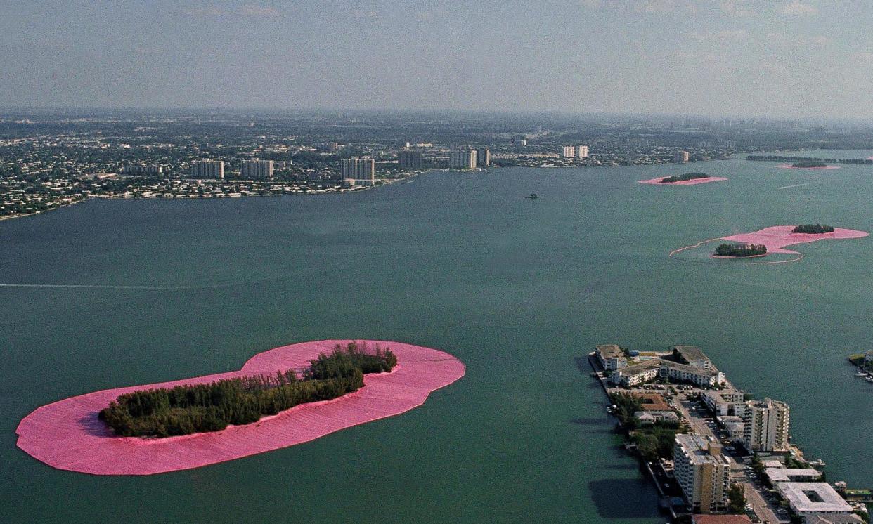 <span>Literally embracing nature … Surrounded Islands in Miami by Jeanne-Claude and Christo.</span><span>Photograph: Pete Wright/AP</span>