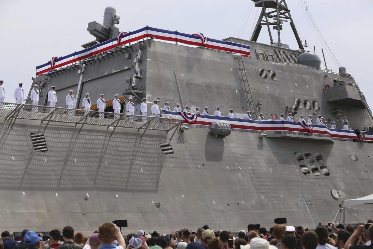 A Navy officer is demoted after sneaking a satellite dish onto a warship to get the internet