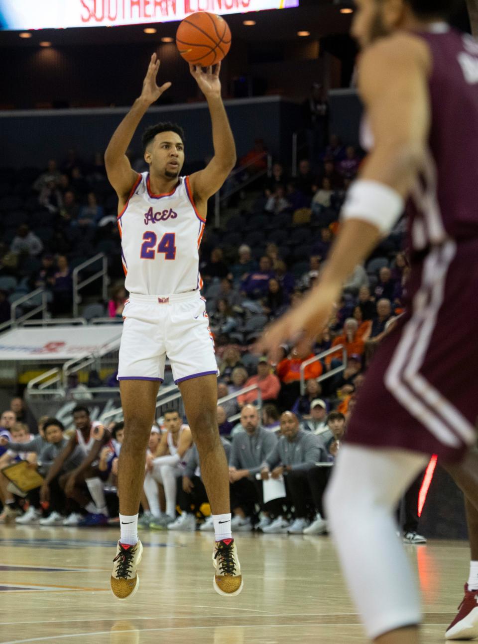 Evansville’s Preston Phillips (24) takes a three-point shot as the University of Evansville Purple Aces play the Southern Illinois Salukis at Ford Center in Evansville, Ind., Wednesday, Nov. 30, 2022. 