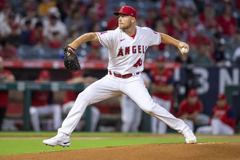 Angels starter Reid Detmers pitches against the Texas Rangers during the first inning Sept. 30, 2022.