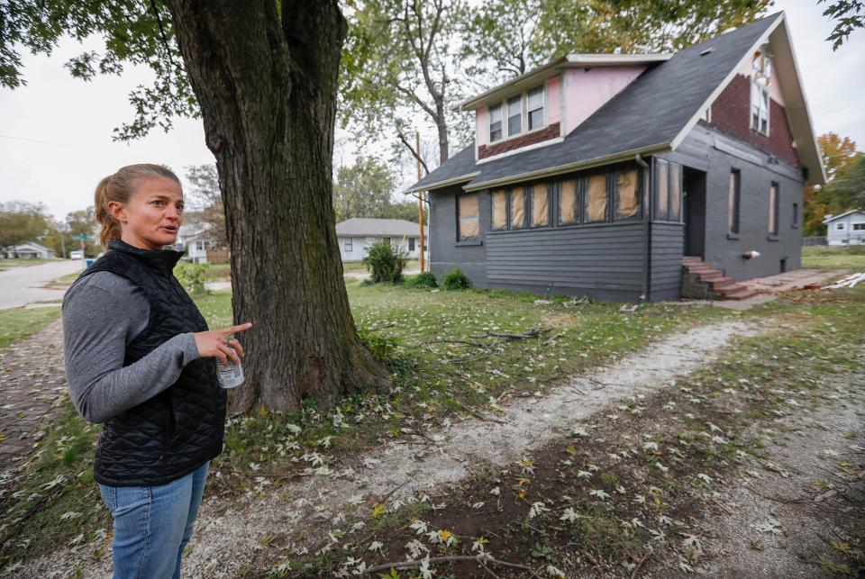 Amy Blansit talks about rehabilitating a home for low-income residents at the intersection of Scott Street and Fairbanks Avenue on Monday, Oct. 28, 2019.