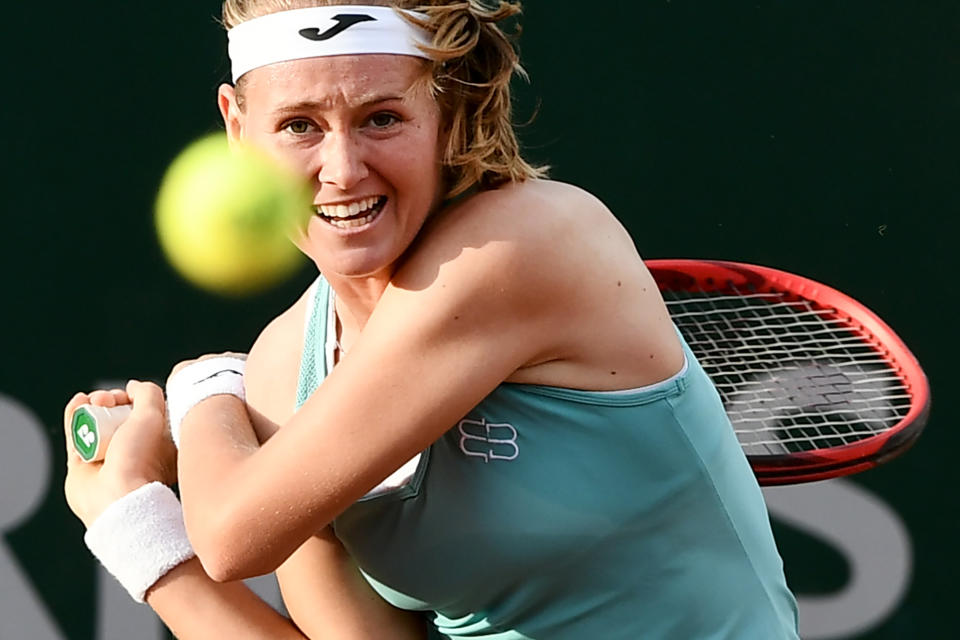 Czech's Marie Bouzkova eyes the ball as she plays a backhand return to Canada's Bianca Andreescu during their women's singles first round match on day two of The Roland Garros 2019 French Open tennis tournament in Paris on May 27, 2019. (Photo by Philippe Lopez/AFP/Getty Images)