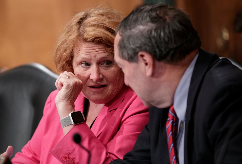 In this Aug. 21, 2018 file photo, Sen. Heidi Heitkamp, D-N.D., left, and Sen. Joe Donnelly, D-Ind., speak on Capitol Hill in Washington. Both senators are from states President Trump won in 2016 and are being targeted to support Judge Brett Kavanaugh for the Supreme Court.