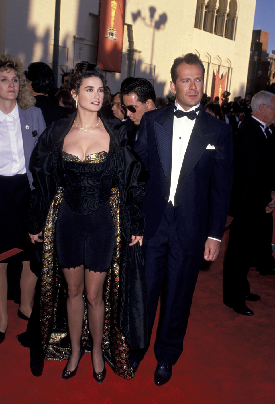 <p>Back in 1989, Moore decided to take matters into her own hands and fashion a look for the biggest red carpet in Hollywood herself. The actress paired a pair of spandex bicycle shorts with a corset and gold brocade fabric.</p> 