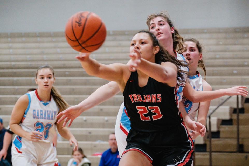 Tusky Valley's Brook Stookey passes against Garaway Wednesday, Dec. 1, 2021 in Sugarcreek.