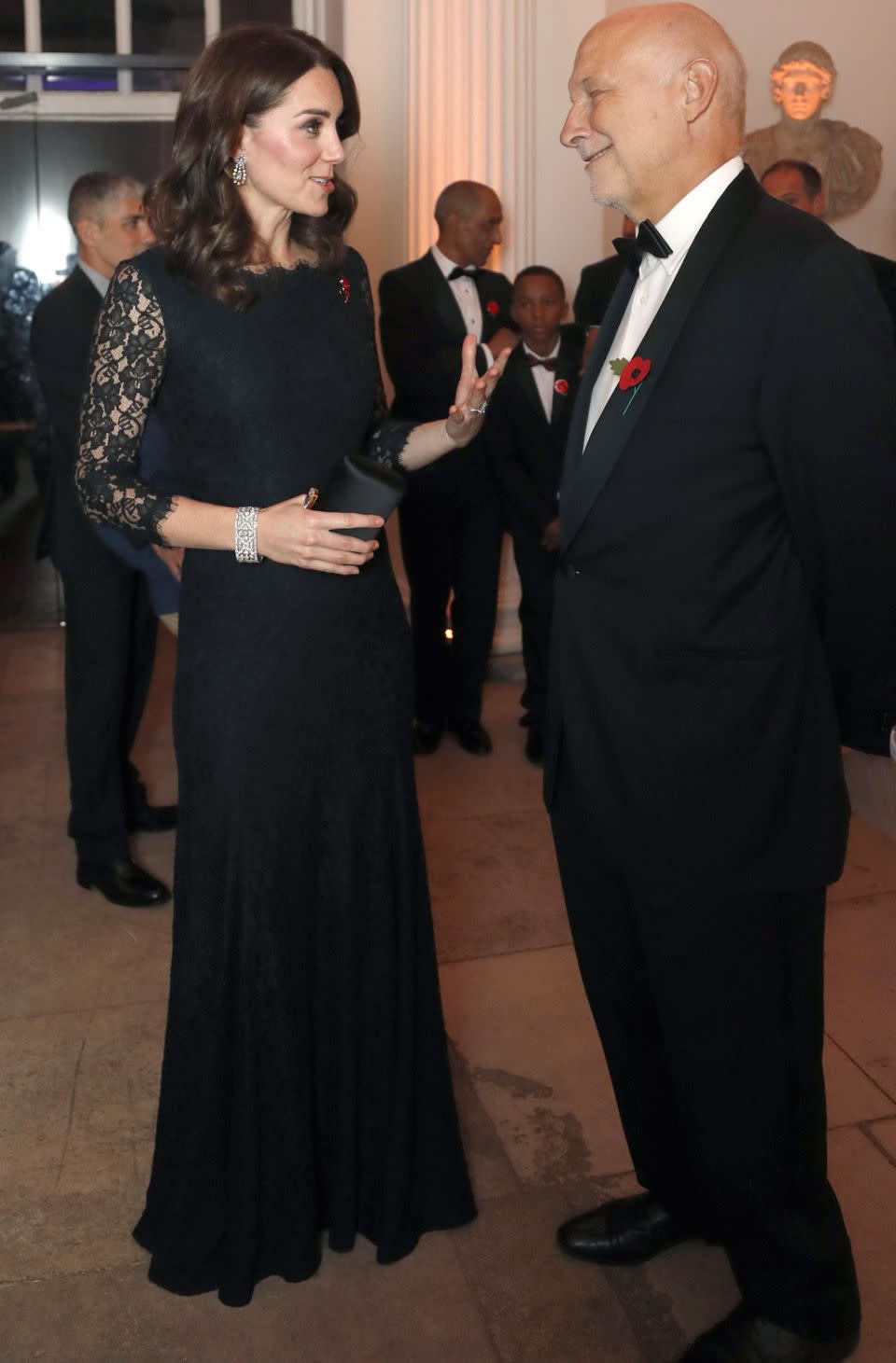 Kate Middleton has showed off her tiny baby bump at a charity gala. Photo: Getty Images