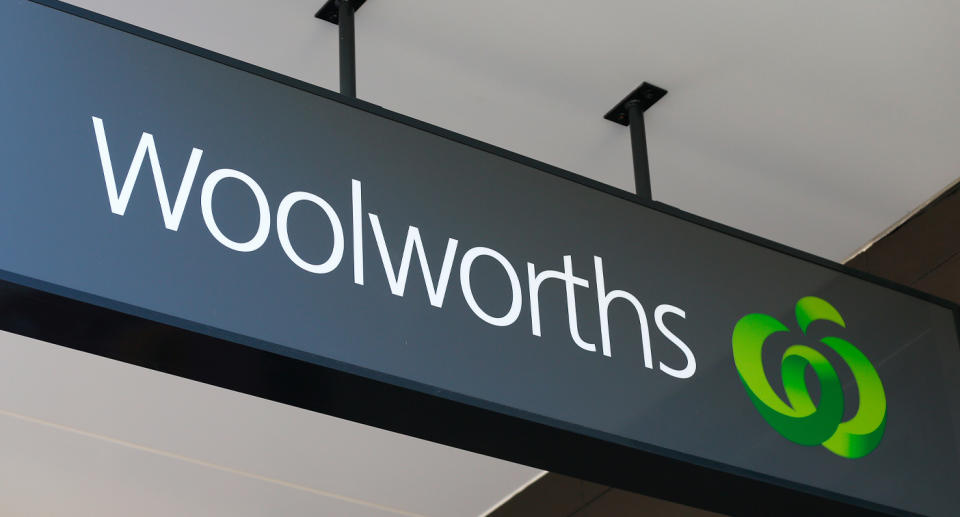 A Woolworth supermarket sign can be seen in the picture. 