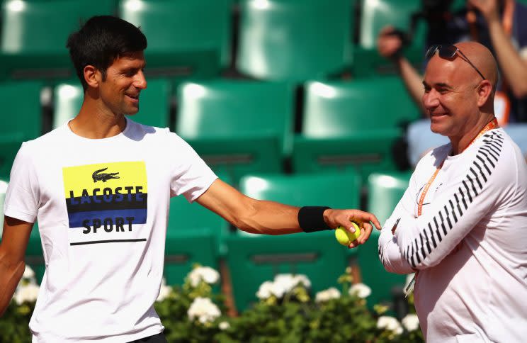 Serbian star Novak Djokovic works with new coach Andre Agassi before Day 4 of the French Open. (Getty Images)