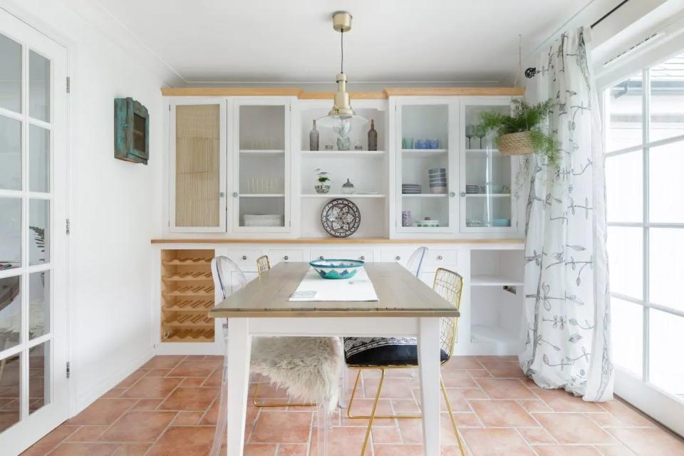 <p>This lovely and bright Airbnb in Cornwall sits in the pretty village of Charlestown, where Poldark and Hollywood movies have been filmed. While it's thoroughly Cornish, there's a Mediterranean feel about the holiday cottage.</p><p>You'll find tiled floors, white walls throughout and elegant pops of green and pastel hues. The Airbnb is ideal for small families, with its location close to the Eden Project, plus the host has been praised for adding a high chair and a gate to the stairs for guests who bring little ones.</p><p><strong>Sleeps</strong>: 4</p><p><strong>Price per night:</strong> £120</p><p><strong>Why we love it: </strong>The light interiors delightful outdoor space make it ideal for summer staycations.</p><p><a class="link " href="https://go.redirectingat.com?id=127X1599956&url=https%3A%2F%2Fwww.airbnb.co.uk%2Frooms%2Fplus%2F27805251%3Fsource_impression_id%3Dp3_1592808764_t%252B2%252FBbEak8bAgizo%26guests%3D1%26adults%3D1&sref=https%3A%2F%2Fwww.countryliving.com%2Fuk%2Ftravel-ideas%2Fstaycation-uk%2Fg32930188%2Fairbnb-cornwall-devon%2F" rel="nofollow noopener" target="_blank" data-ylk="slk:SEE INSIDE;elm:context_link;itc:0;sec:content-canvas">SEE INSIDE</a></p>