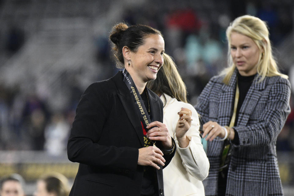 FILE - Portland Thorns FC head coach Rhian Wilkinson reacts after Portland defeated the Kansas City Current in the NWSL soccer championship match against the Kansas City Current, Saturday, Oct. 29, 2022, in Washington. Wilkinson resigned Friday, Dec. 2, 2022, just five weeks after she led the team to the championship. (AP Photo/Nick Wass, File)