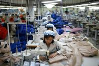 North Korean employees work at a South Korean-owned factory in the Joint Industrial Park in Kaesong on the border between the two states