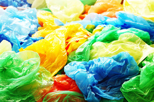 <span class="caption">A mandatory plastic bag charge has been a huge success across the UK.</span> <span class="attribution"><a class="link " href="http://www.shutterstock.com/pic-419263519/stock-photo-a-lot-of-colorful-plastic-bags.html?src=Lr0cO-wUvPCvKZpPdXcb0Q-3-24" rel="nofollow noopener" target="_blank" data-ylk="slk:Pabel Kubarkov/Shutterstock;elm:context_link;itc:0;sec:content-canvas">Pabel Kubarkov/Shutterstock</a></span>