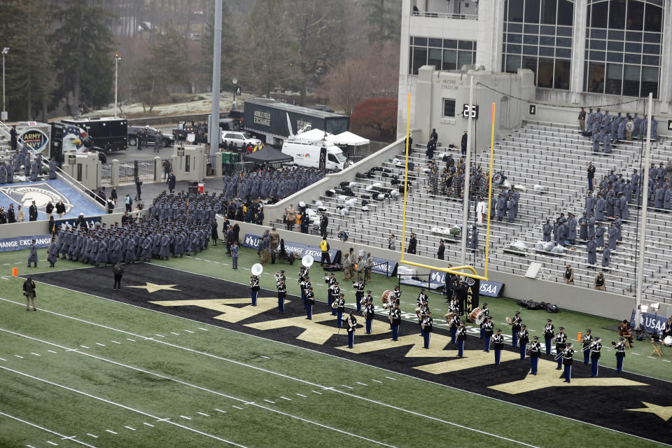 The Army band march on to the field before the 121st Army Navy NCAA college football game, Saturday, Dec. 12, 2020, in West Point, N.Y. (AP Photo/Adam Hunger)