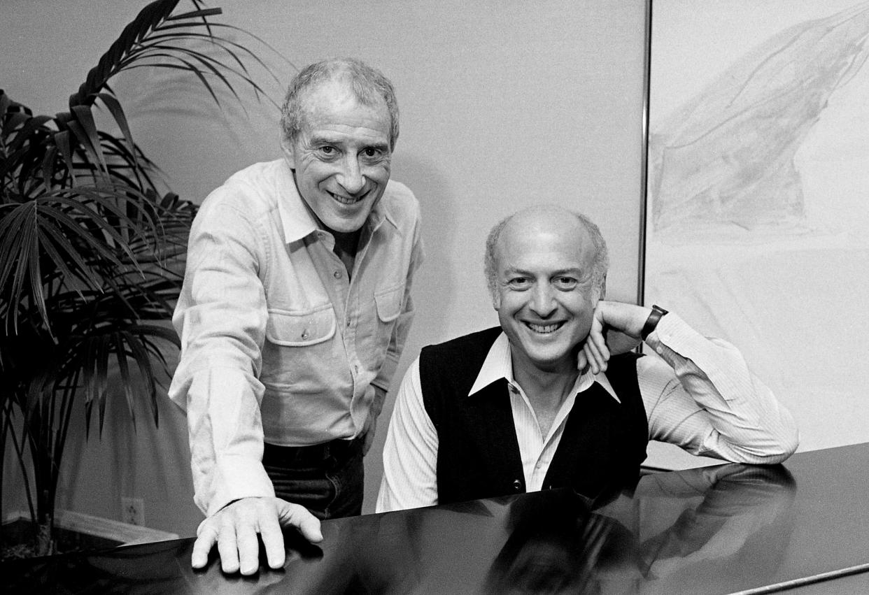 Jerry Leiber, left, and Mike Stoller get together Feb. 5, 1985 at the piano in the Vanderbilt Plaza Hotel lobby to reminisce about their 35 years as a hit songwriting team. Every pop act from The Beatles to Joni Mitchell has recorded their classic songs. Now theyÕre turning their attention toward Music CityÕs stars.