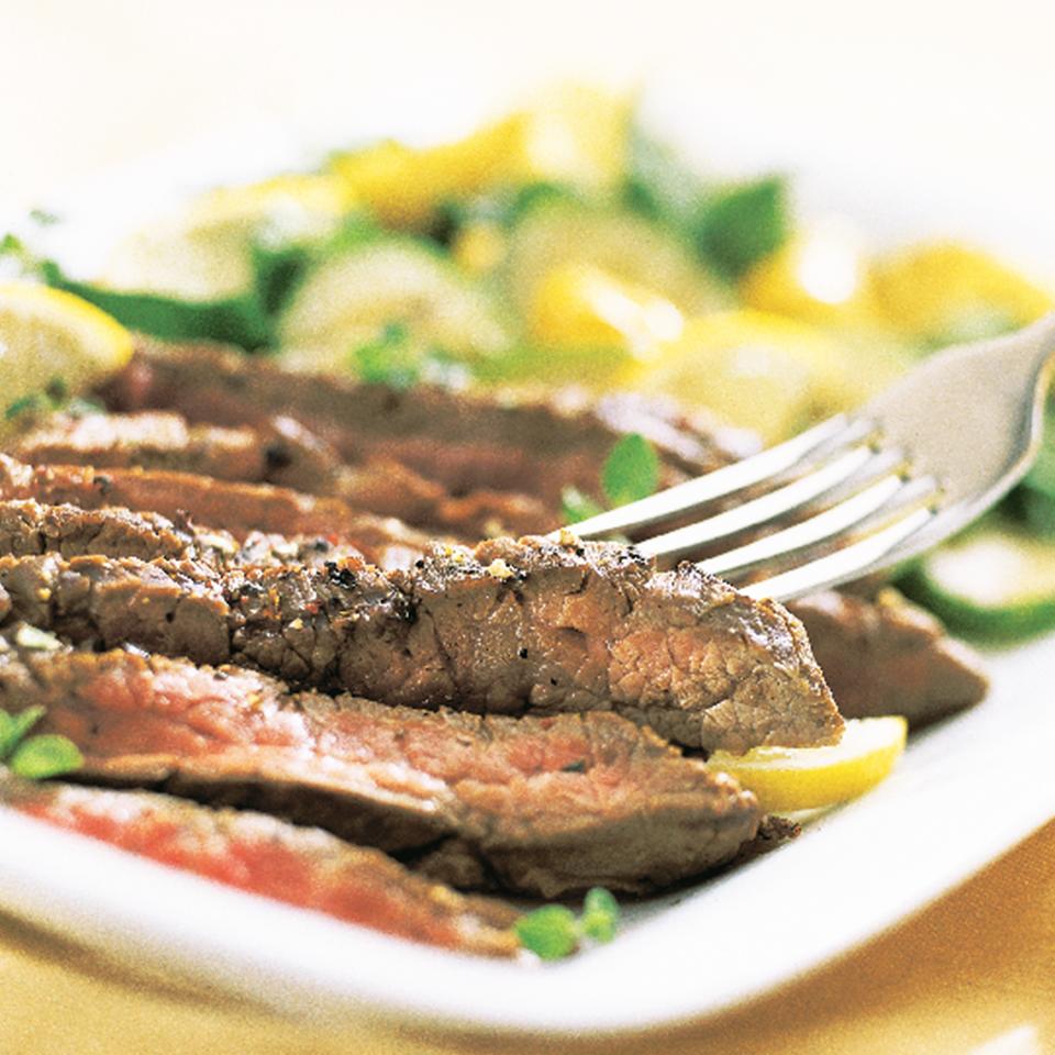 <p>Flank steak has fewer calories than other cuts of beef and loads of protein. In this recipe, it's seasoned with a simple--yet flavorful--dry rub of oregano, lemon peel and black pepper. Serve it with your favorite grilled or roasted veggies. <a href="https://www.eatingwell.com/recipe/267422/lemon-pepper-steak/" rel="nofollow noopener" target="_blank" data-ylk="slk:View Recipe;elm:context_link;itc:0;sec:content-canvas" class="link ">View Recipe</a></p>