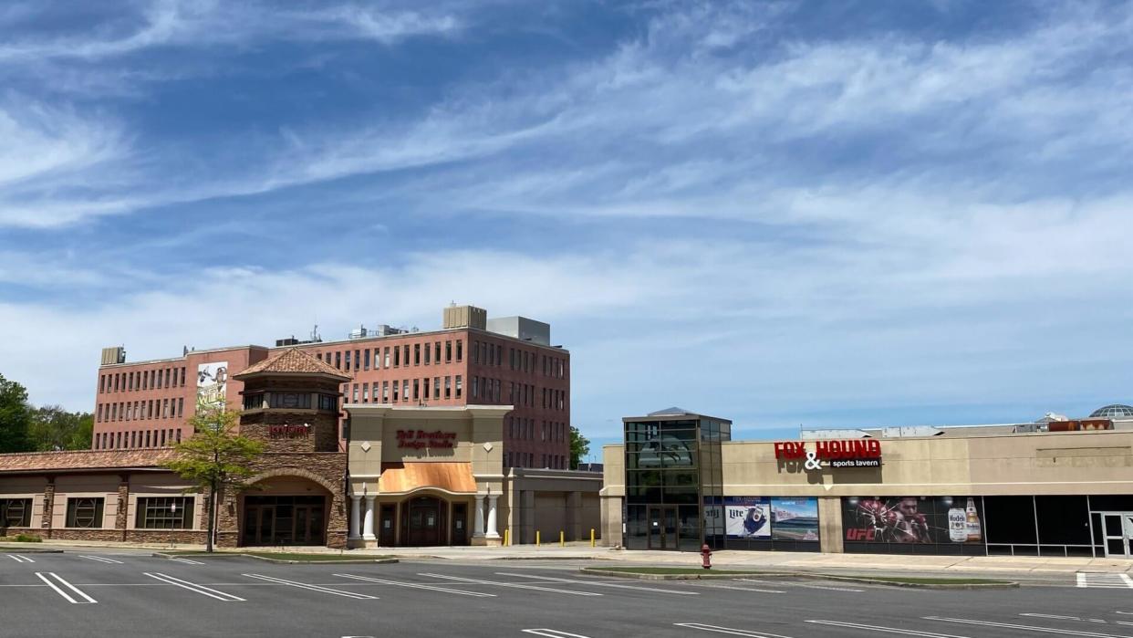 EDISON, NEW JERSEY - May 16, 2020: A view of the exterior of Menlo Park Mall, empty, during the coronavirus pandemic shutdown.