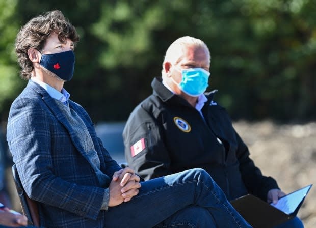 During the 2021 election campaign, Liberal leader Justin Trudeau spent less time criticizing Ontario Premier Doug Ford than he did during the 2019 campaign. In this September 2020 photo, the pair participated in an event at a gold mining site in Gogama, Ont. (Nathan Denette/The Canadian Press - image credit)