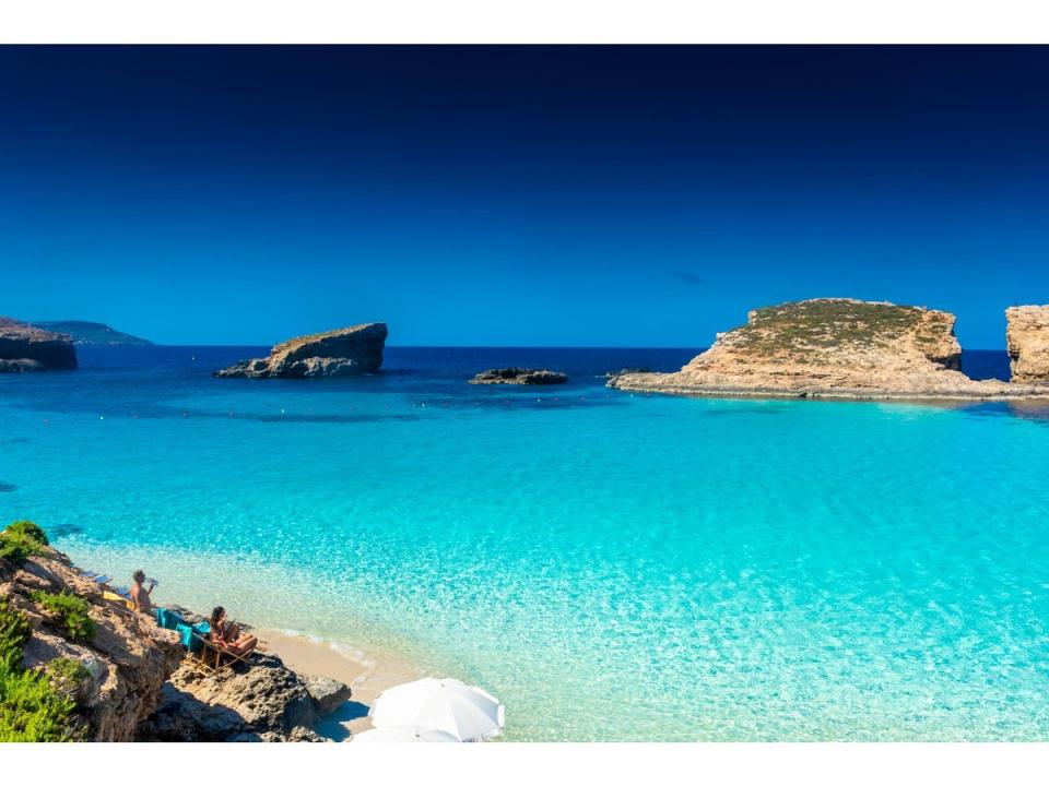 Take a dip in Comino’s turquoise bay (Getty Images/iStockphoto)