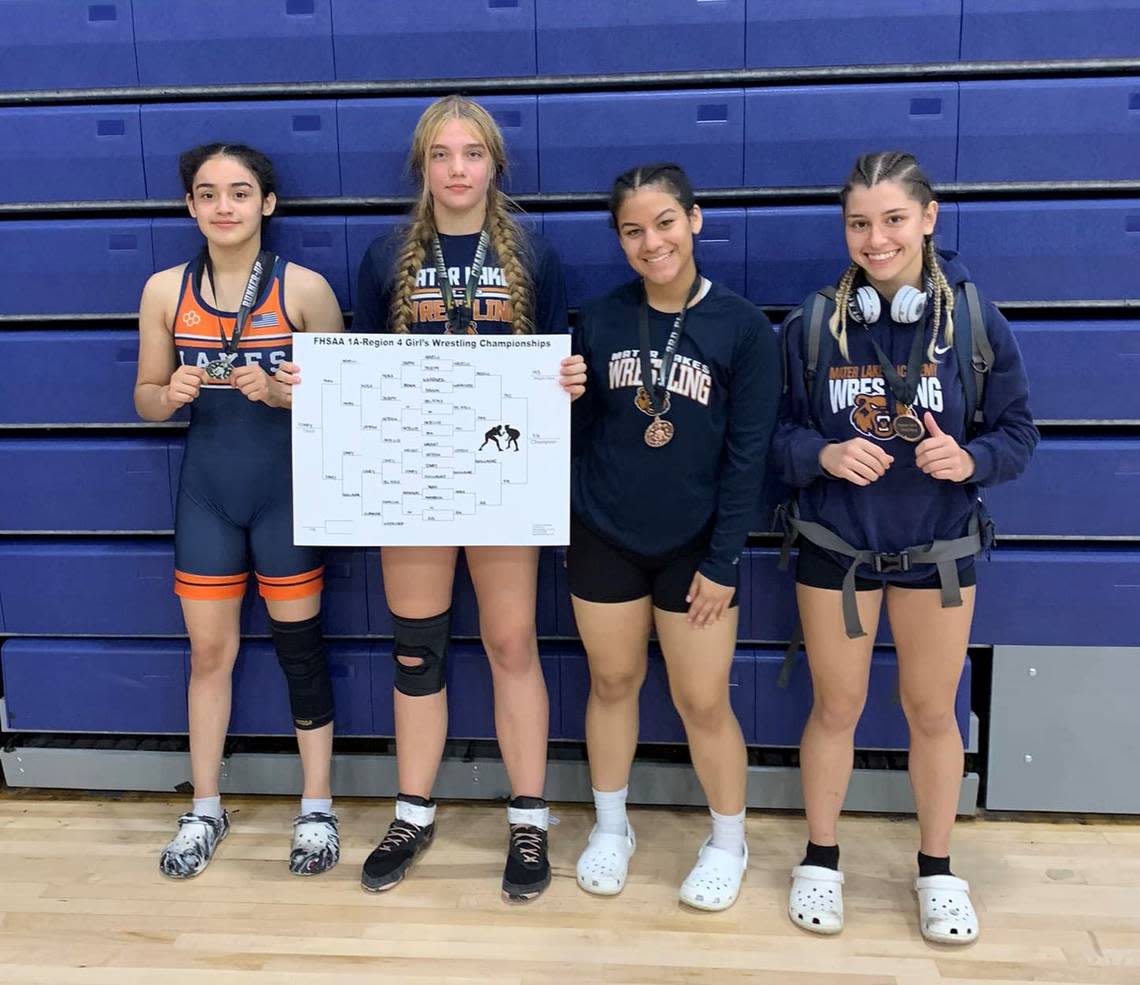 Arianna Ruiz, Alena Rik, Janice Quiroa, and Sofia Ferran of the Mater Lakes Academy girls’ wrestling team qualified for state at the regional tournament in Wellington.