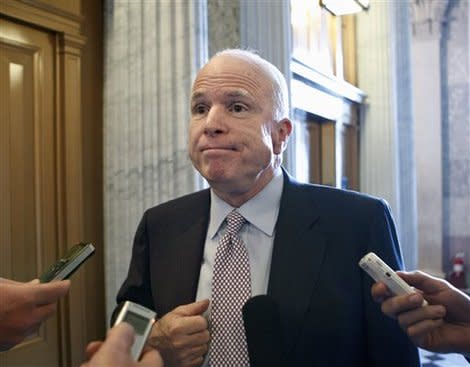 Senator John McCain talks to reporters on Capitol Hill in Washington on March 5, 2012. (AP Photo/J. Scott Applewhite)