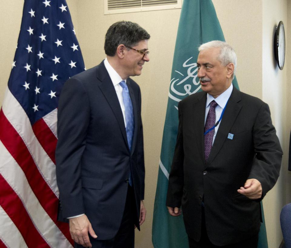 Treasury Secretary Jacob Lew speaks with Saudi Arabian Finance Minister Ibrahim Al-Assaf during a meeting at the World Bank Group-International Monetary Fund Spring Meetings in Washington, Friday, April 11, 2014. ( AP Photo/Jose Luis Magana)